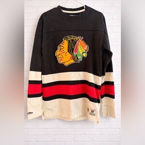 Vintage Chicago Blackhawks Mitchell & Ness authentic NHL hockey jersey.